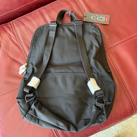 Tumi Black Backpack with Gold Accents - Picture 2 of 5